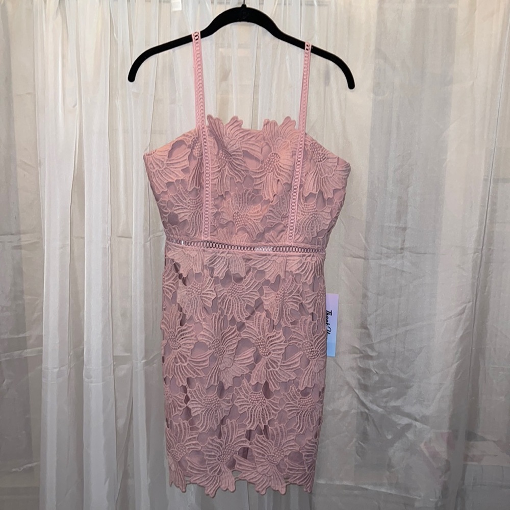 Pink floral textured, fitted dress. Great for a wedding guest!